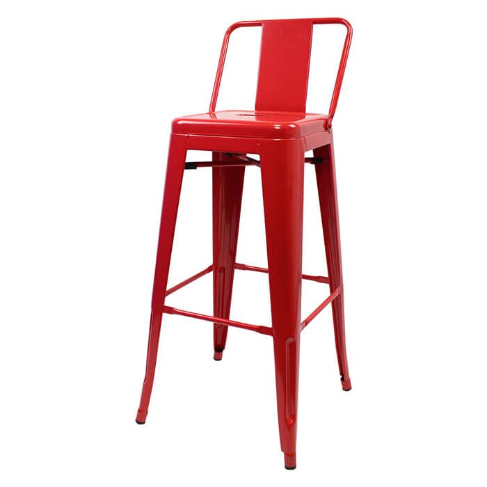 Profile view of red Tolix low back stool