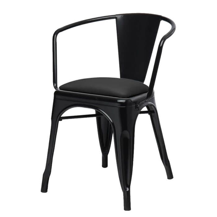 Profile view of gloss black Tolix armchair with dome seat
