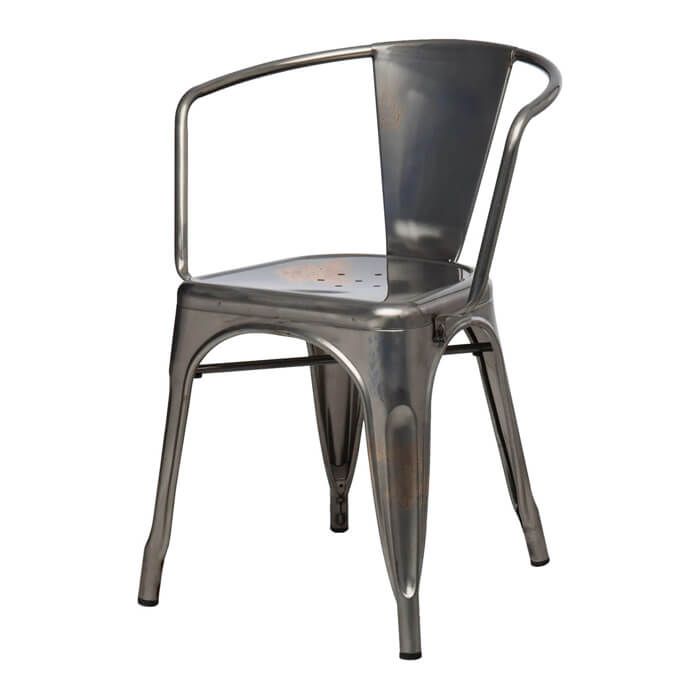 Profile view of industrial grey Tolix armchair