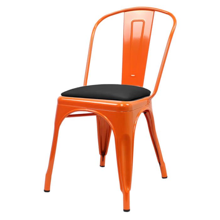 Profile view of orange Tolix chair with dome seat