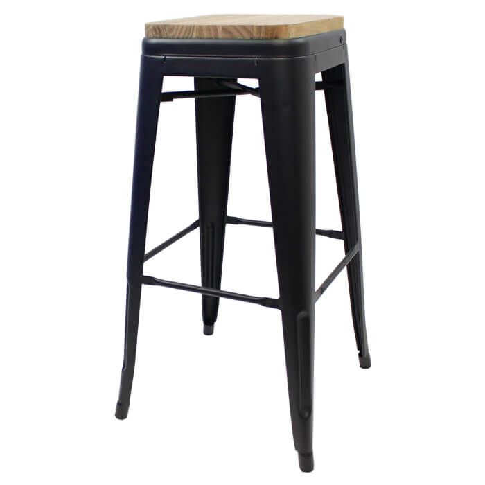 Profile view of matte black Tolix low stool with oak seat