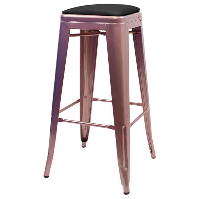 Profile view of rose gold Tolix bar stool with dome seat