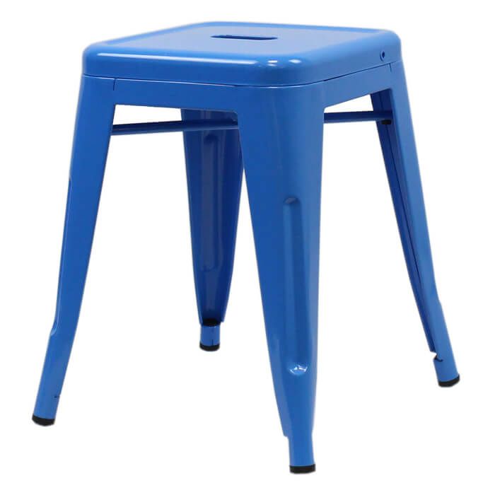 Profile view of blue Tolix low stool