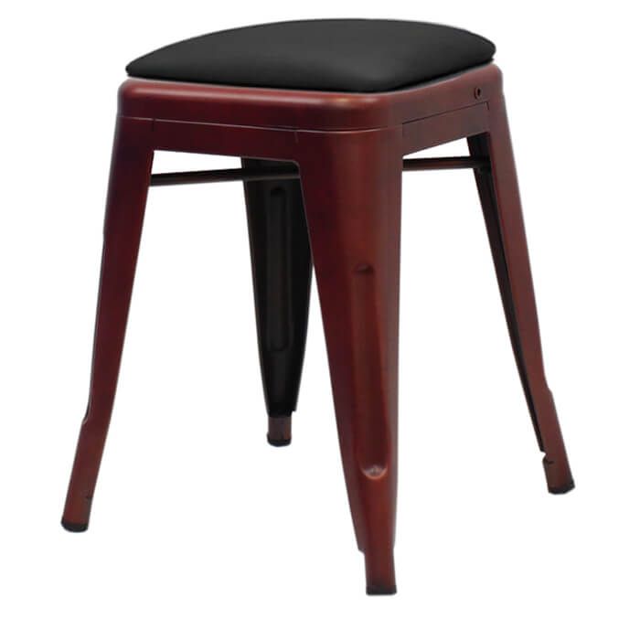 Profile view of copper Tolix low stool with dome seat