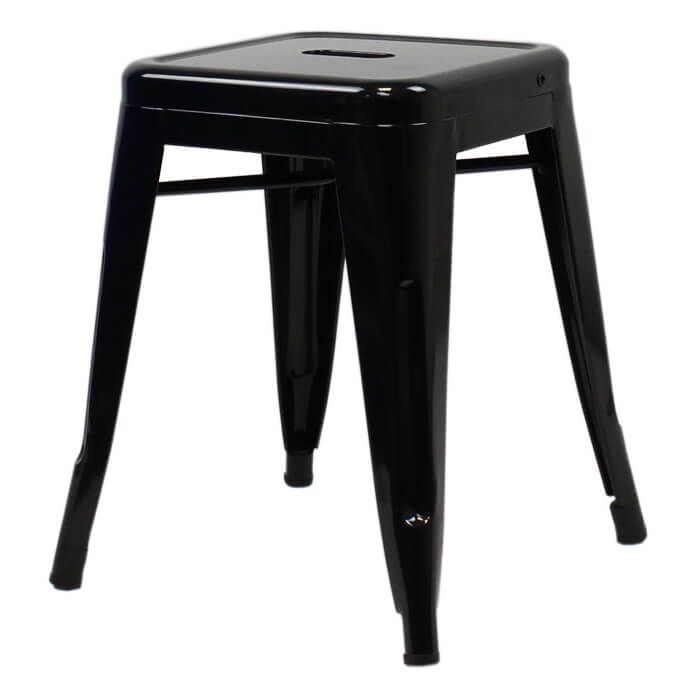 Profile view of gloss black Tolix low stool