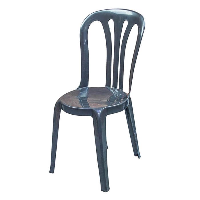 Profile view of green Garrotxa plastic chair