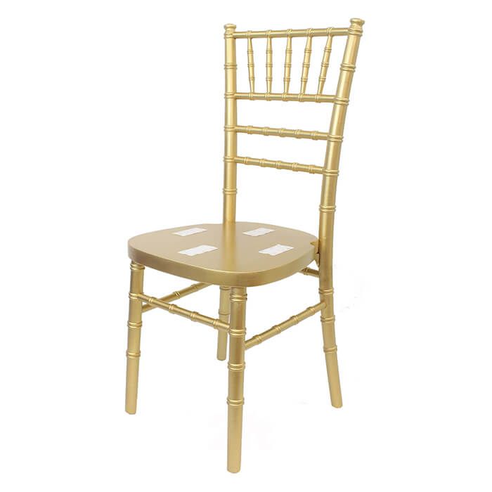 Profile view of gold Chiavari chair