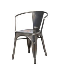 Profile view of industrial grey Tolix armchair
