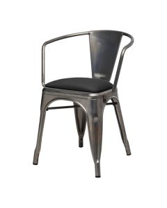 Profile view of industrial grey Tolix armchair with dome seat