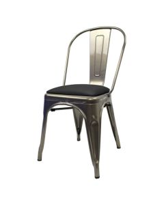 Profile view of industrial grey Tolix chair with dome seat