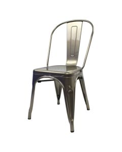 Profile view of industrial grey Tolix side chair