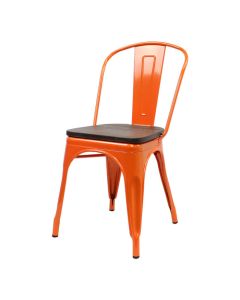 Profile view of orange Tolix chair with walnut seat