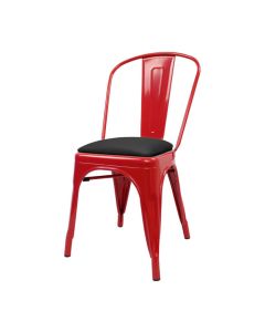 Profile view of red Tolix chair with dome seat