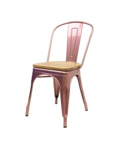 Profile view of rose gold Tolix chair with oak seat