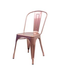Profile view of rose gold Tolix side chair