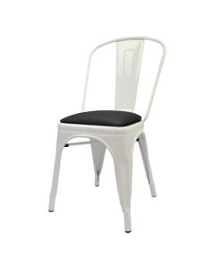 Profile view of white Tolix chair with dome seat