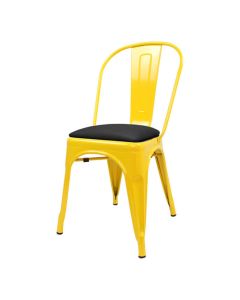 Profile view of yellow Tolix chair with dome seat