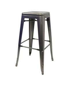 Profile view of industrial grey Tolix breakfast stool