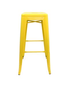Profile view of yellow Tolix bar stool