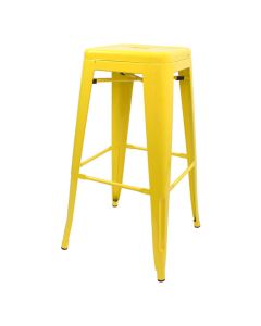 Profile view of yellow Tolix bar stool