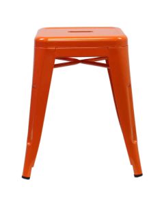 Profile view of orange Tolix low stool