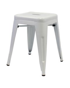 Profile view of white Tolix low stool