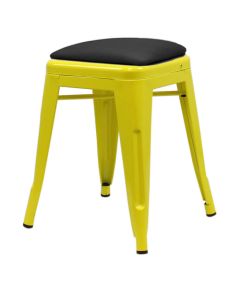 Profile view of yellow Tolix low stool with dome seat