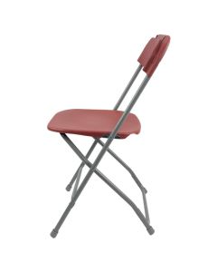 Profile view of burgundy economy plastic folding chair