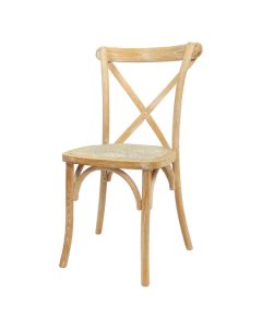 Profile view of distressed rattan Crossback chair