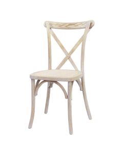 Profile view of Limewash rattan Crossback chair