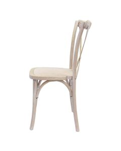 Profile view of Limewash rattan Crossback chair