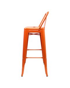 Profile view of orange Tolix low back stool